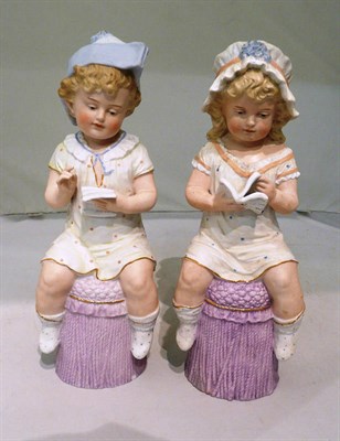 Lot 289 - Pair of German Parian figures 'Children Reading'