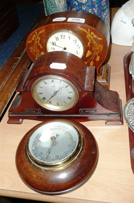 Lot 298 - Two inlaid mahogany mantel timepieces and a barometer