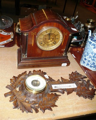 Lot 305 - An inlaid striking mantel clock and an aneroid barometer