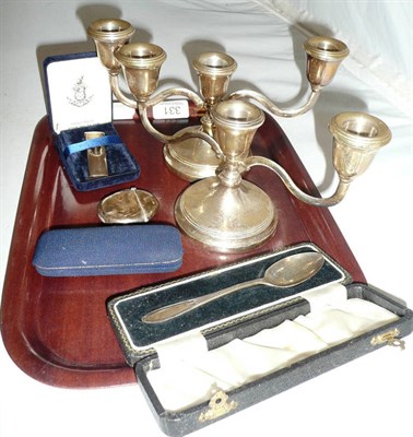 Lot 331 - A pair of silver candlesticks, silver spoon, silver vesta case, a silver cigar cutter and...