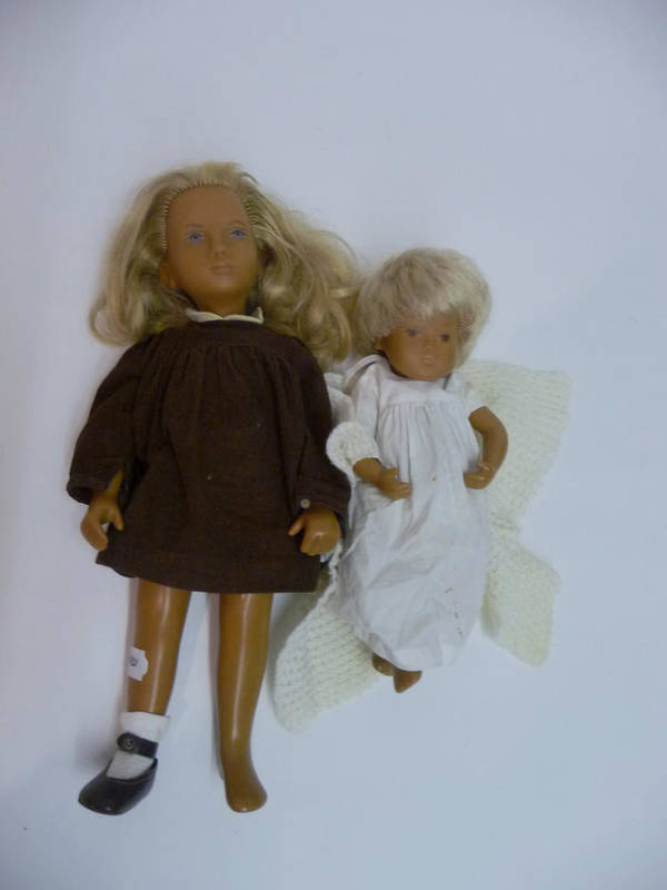 Lot 1017 - Early Blonde Sasha Doll  with blue painted eyes and no philtrum wearing a brown cord dress and...