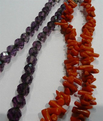 Lot 5 - A coral branch necklace, a faceted amethyst bead necklace and a heart pendant