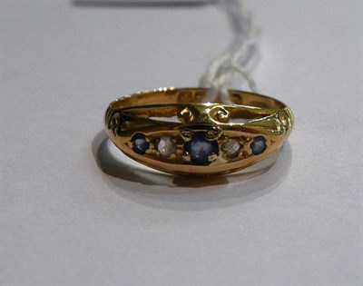Lot 7 - An 18ct gold sapphire and diamond five stone ring