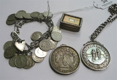 Lot 34 - A silver vinaigrette, a bracelet, a coin on chain and a coin