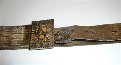 Lot 44 - An Ottoman silver coloured metal belt, Tughra hallmark pre 1928