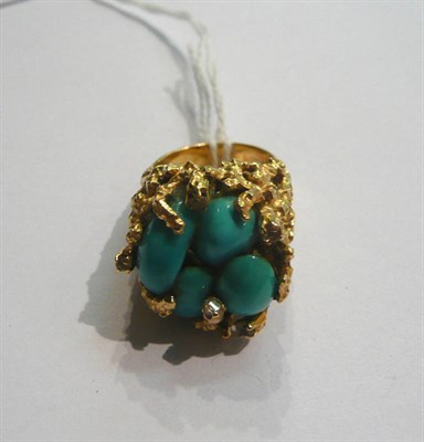 Lot 46 - An 18ct gold turquoise-set ring, 19.3g
