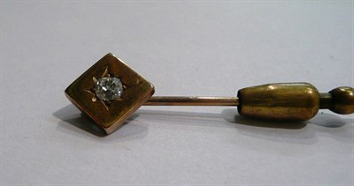 Lot 57 - Diamond-set stick pin