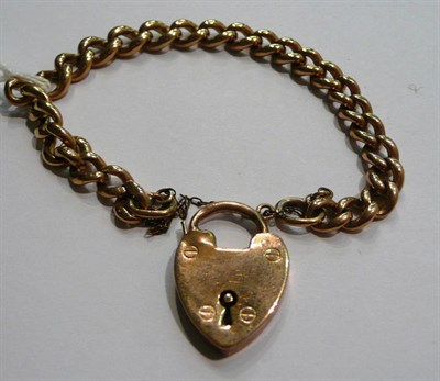 Lot 59 - A 9ct rose gold curb and lock bracelet
