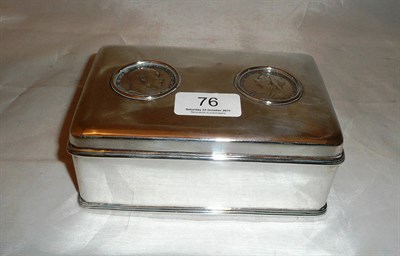 Lot 76 - A silver cigarette box mounted with two crowns