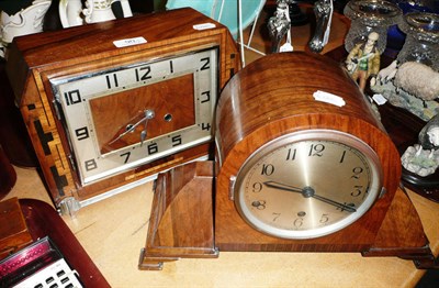 Lot 90 - An Art Deco walnut mantel clock by Heller and another in a domed case (2)