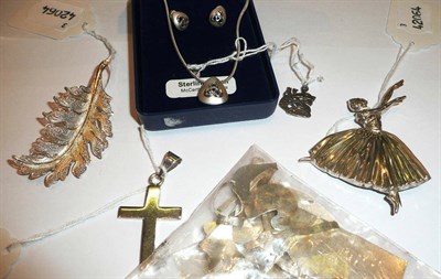 Lot 395 - A silver ballerina brooch, cross, leaf brooch, necklace and matching earrings and a small...