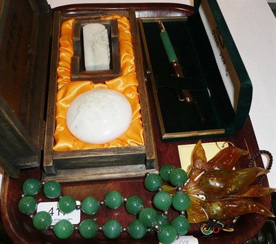 Lot 417 - A green beaded hardstone necklace, a floral Jade piece, cased pen and wooden cased inkwell and seal