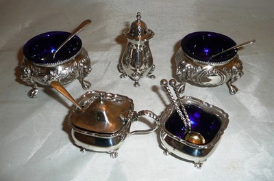 Lot 419 - Pair of Victorian salts with claw feet and a three piece silver cruet set