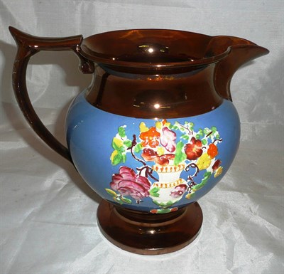 Lot 428 - A large copper lustre jug