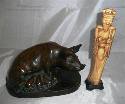 Lot 438 - A bronze resin Gleptosil sow and litter and a resin figure of a Chinese fisherman
