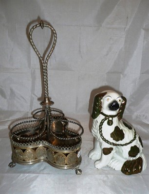 Lot 451 - A Staffordshire ceramic dog and a plated three division bottle holder