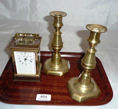 Lot 464 - Carriage timepiece and a pair of brass candlesticks
