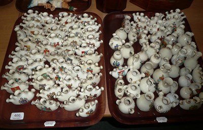 Lot 466 - Approximately ninety six pieces of crested china, on two trays