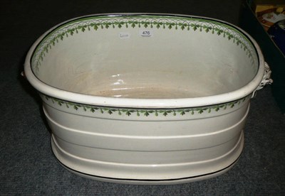 Lot 476 - A 19th century cream pottery footbath (a.f.) possibly Wedgwood