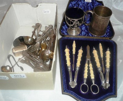 Lot 503 - A box of silver and sterling flatware, including a silver Christening mug, silver framed...