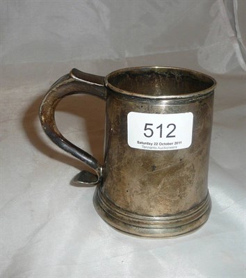 Lot 512 - A white metal tankard, (a.f.)