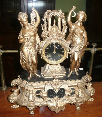 Lot 551 - A gilt metal black slate striking mantel clock