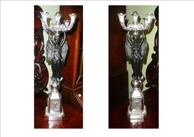 Lot 558 - Pair of reproduction candlesticks