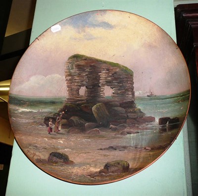 Lot 562 - A terracotta charger painted with the rock at Hartlepool by Harry Marston