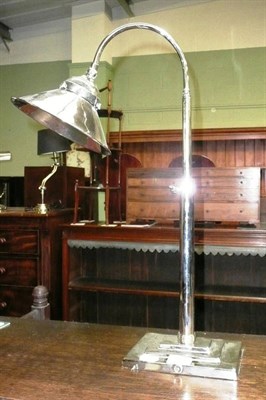 Lot 570 - A white metal desk lamp