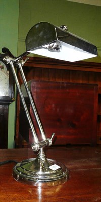 Lot 573 - A white metal desk lamp