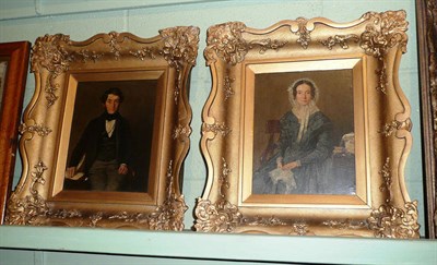 Lot 598 - Pair of oil portraits of a man and a woman