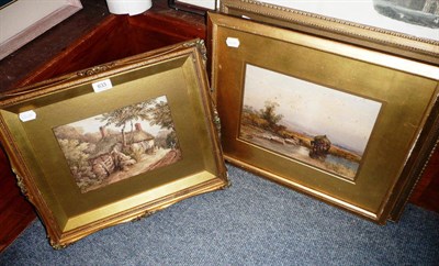 Lot 633 - Three watercolours by J Wynn Williams - Haycart near a river, cottage scene and a church