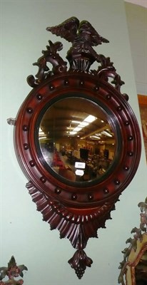 Lot 641 - A Regency style mahogany framed convex wall mirror