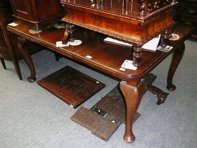 Lot 656 - A Victorian mahogany wind-out table