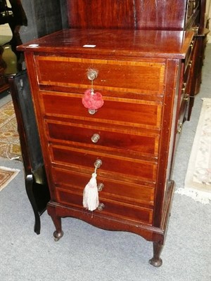 Lot 664 - Edwardian banded mahogany music cabinet