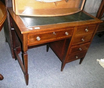 Lot 672 - Edwardian inlaid writing table with green leather top