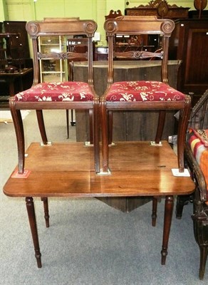 Lot 686 - Georgian mahogany Pembroke table and two dining chairs