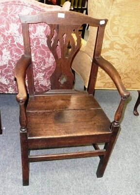 Lot 700 - A Georgian oak country armchair