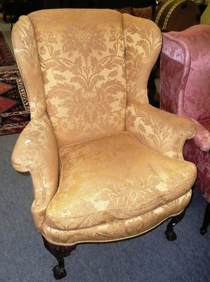 Lot 701 - 19th century winged back armchair
