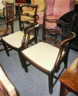 Lot 705 - Pair of mahogany elbow chairs, one damaged
