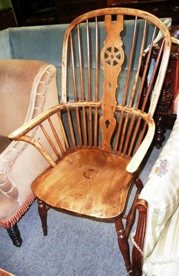 Lot 732 - Ash and elm wheel back Windsor chair