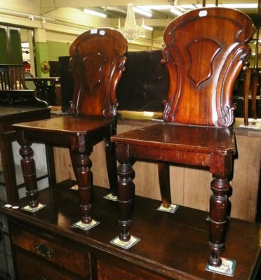 Lot 773 - Pair of Victorian mahogany hall chairs