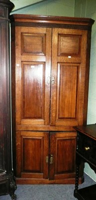 Lot 785 - Early 19th century oak standing corner cupboard