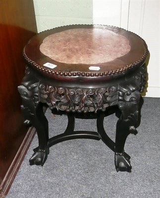 Lot 803 - A Chinese Padouk wood jardiniere stand