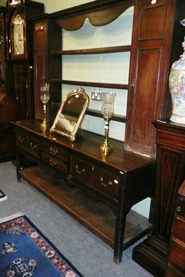 Lot 807 - Oak dresser with rack of shelves and cupboards