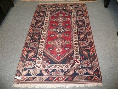 Lot 820 - Yagibedir Rug West Anatolia The blood red field enclosed by indigo borders