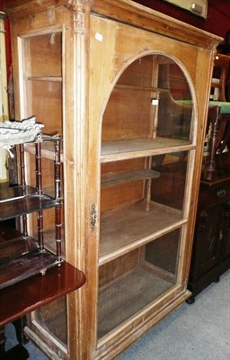 Lot 878 - Pine glazed cupboard