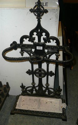 Lot 976 - Victorian cast-iron rope-twist stick stand with white drip-tray