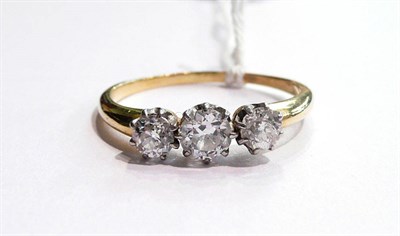 Lot 7 - A three stone diamond ring