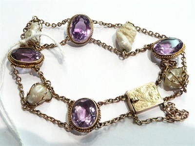 Lot 8 - A Baroque pearl amethyst bracelet
